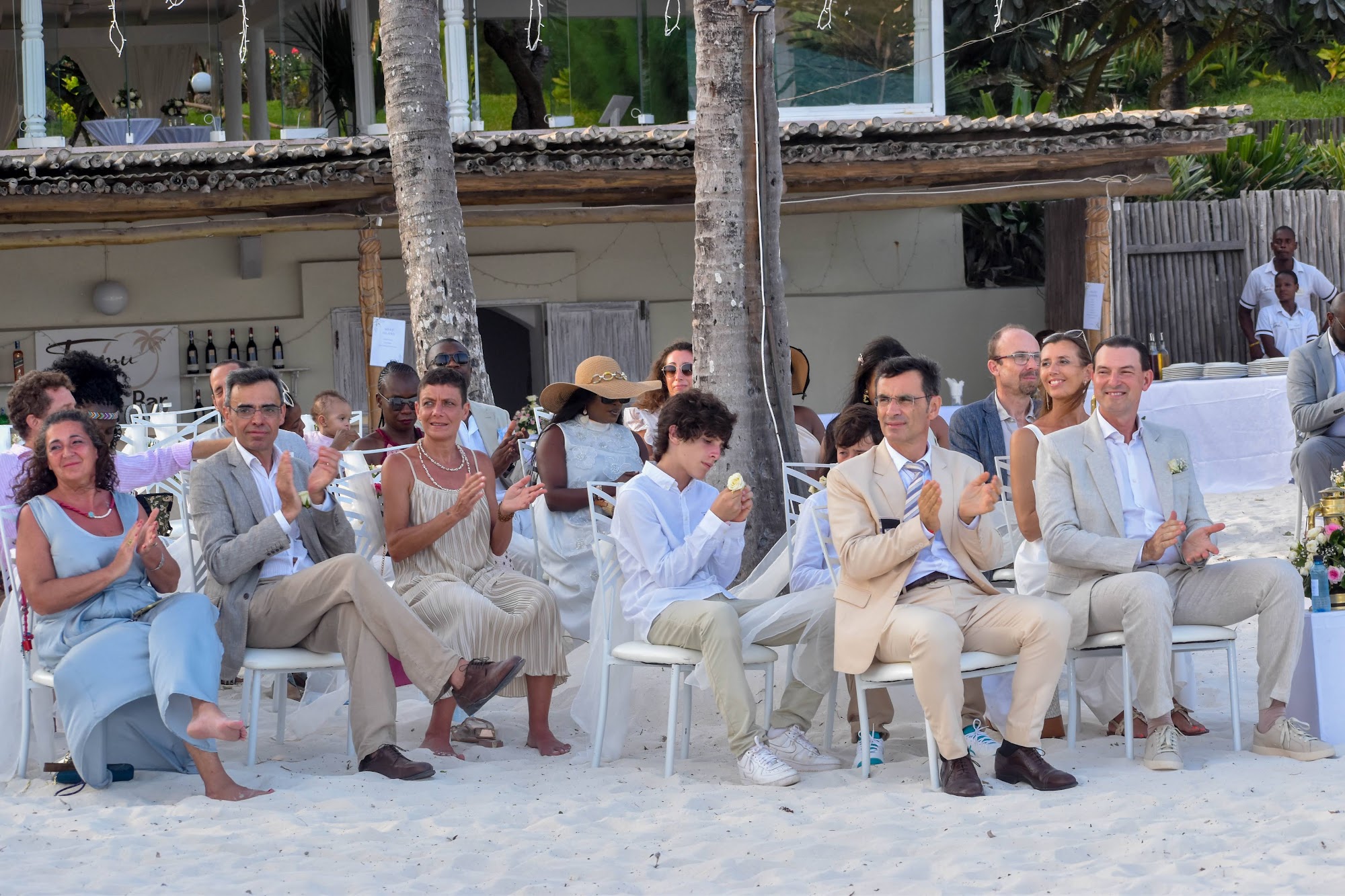 Guests seated for a beach wedding ceremony in Kenya
